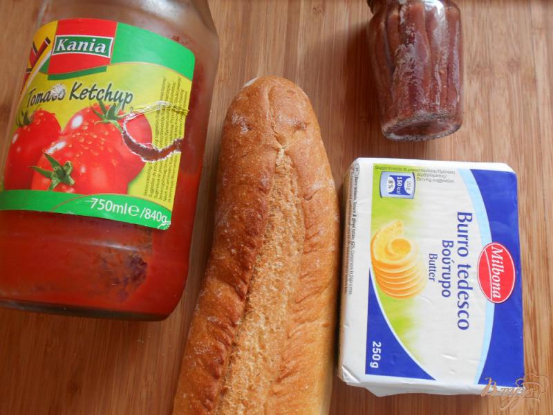 Фото приготовление рецепта: Брускетта с анчоусами и томатным маслом шаг №1