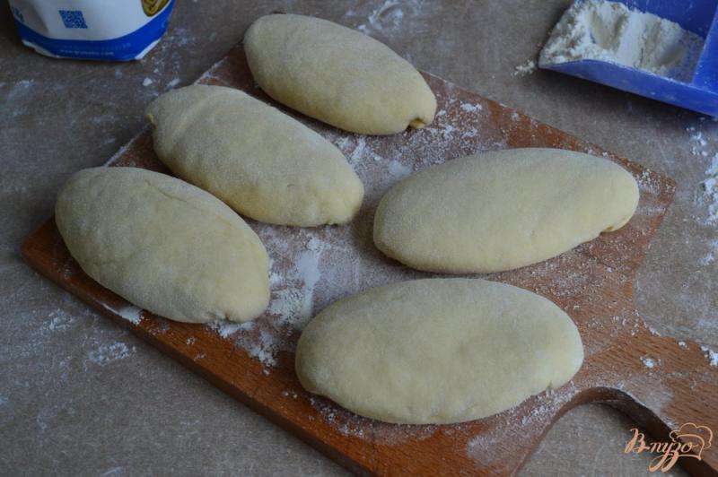 Фото приготовление рецепта: Быстрые пирожки с морковной начинкой шаг №8