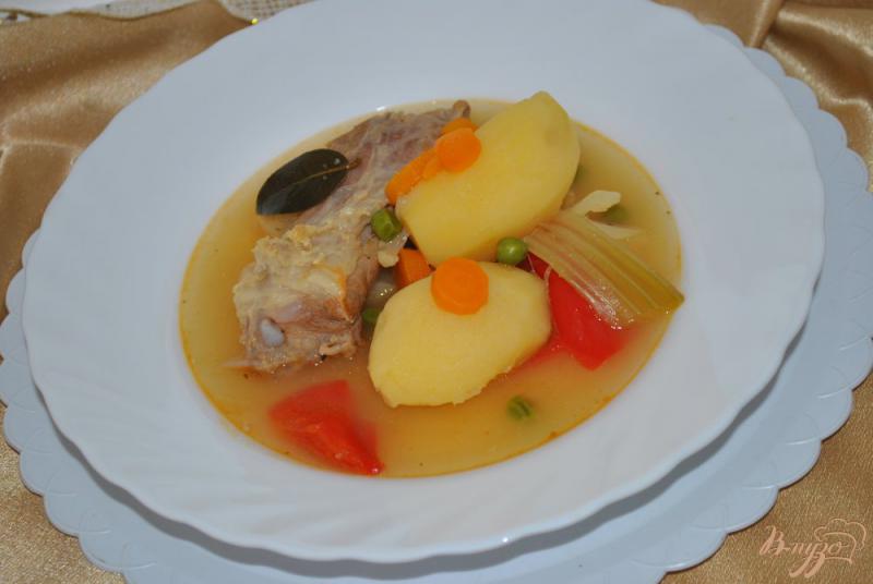Фото приготовление рецепта: Жаркое со свиными ребрами, овощами и хамоном шаг №14