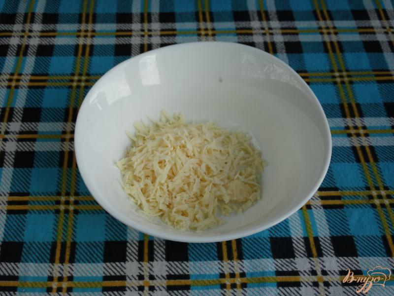Фото приготовление рецепта: Кабачковая закуска с сыром и маслинами шаг №6
