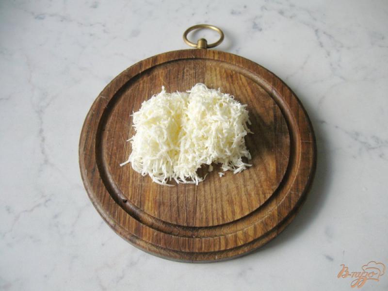 Фото приготовление рецепта: Закуска из кабачков и сыра. шаг №6
