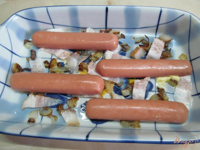 Фото приготовление рецепта: Сосиски в тесте шаг №4