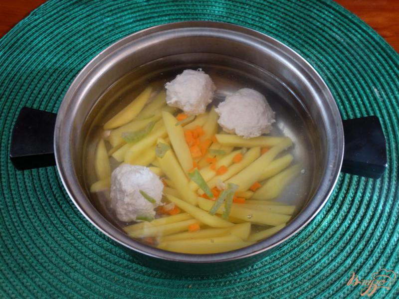 Фото приготовление рецепта: Суп с пшеном и цветной капустой шаг №5