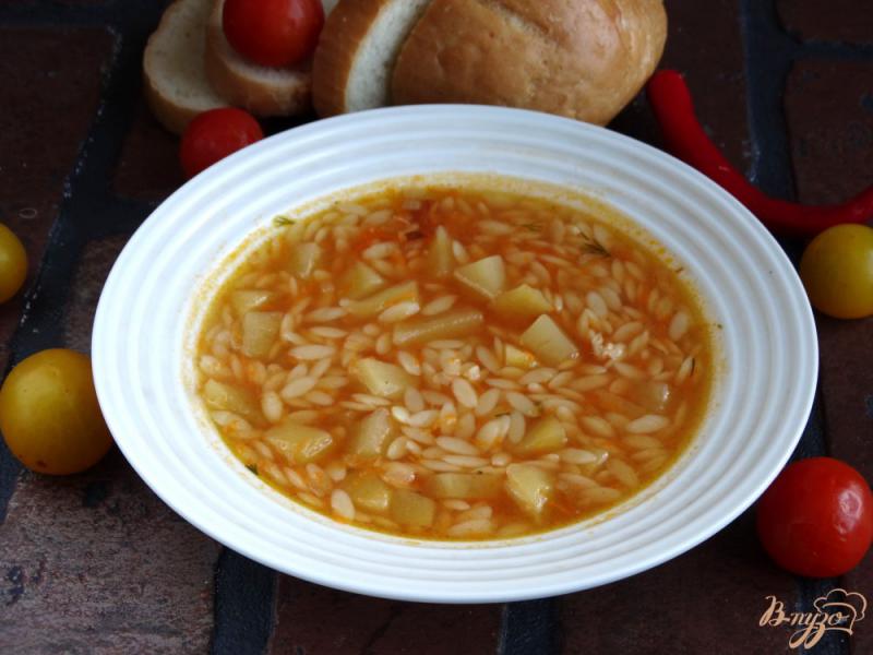 Фото приготовление рецепта: Томатный суп с ризони шаг №10