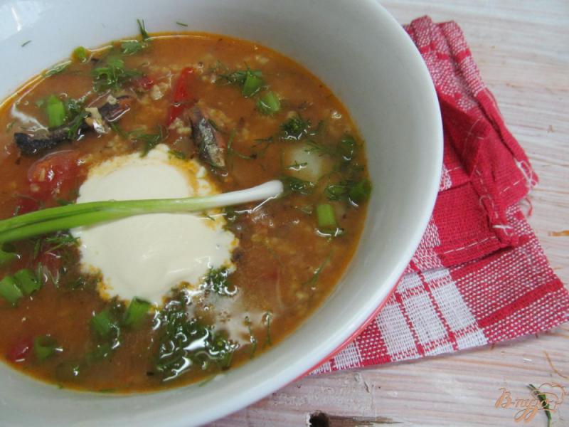 Фото приготовление рецепта: Суп из кильки в томате шаг №8