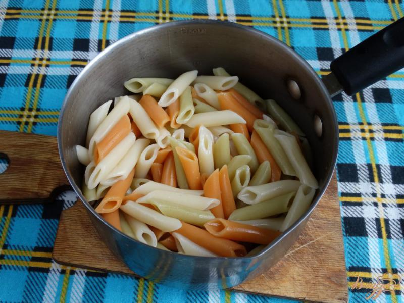 Фото приготовление рецепта: Паста в сливочно-грибном соусе шаг №7