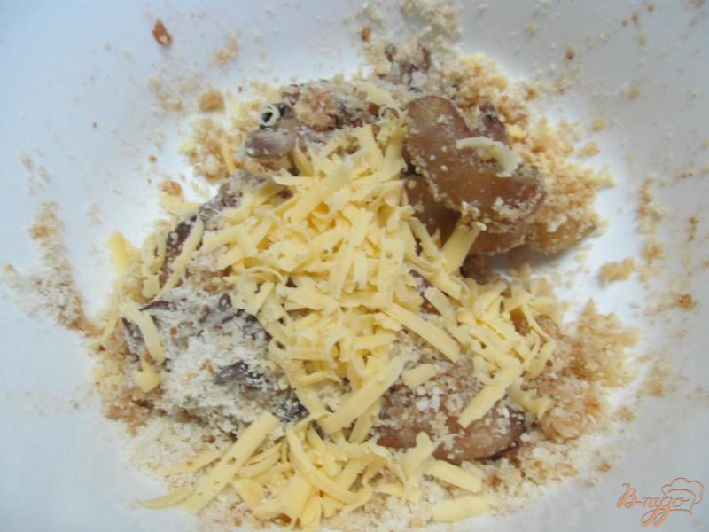 Фото приготовление рецепта: Куриные бедра с сыром в духовке шаг №8
