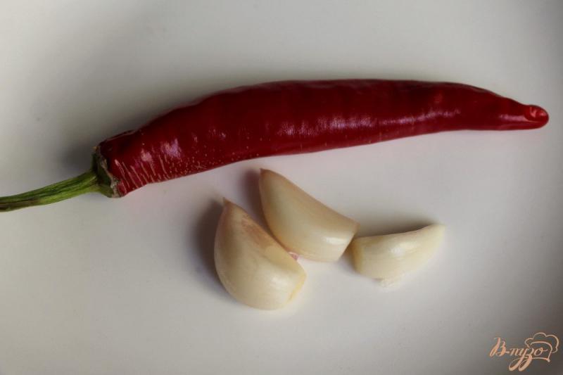Фото приготовление рецепта: Баклажаны в остром томатном соусе шаг №3