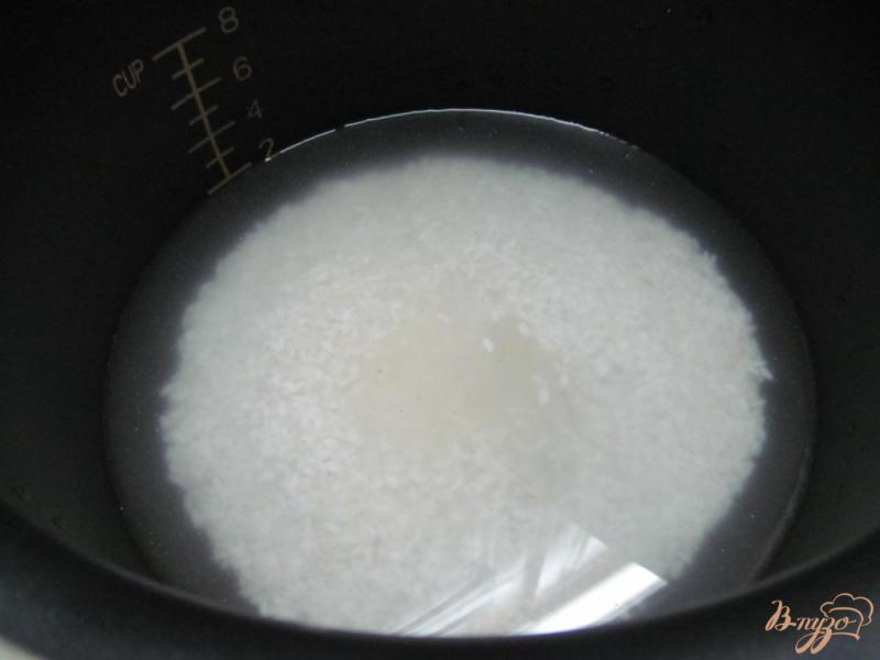 Фото приготовление рецепта: Рисовая каша с малиной в мультиварке шаг №2