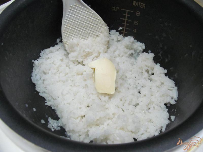 Фото приготовление рецепта: Рисовая каша с малиной в мультиварке шаг №4