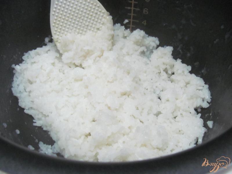 Фото приготовление рецепта: Рисовая каша с малиной в мультиварке шаг №3