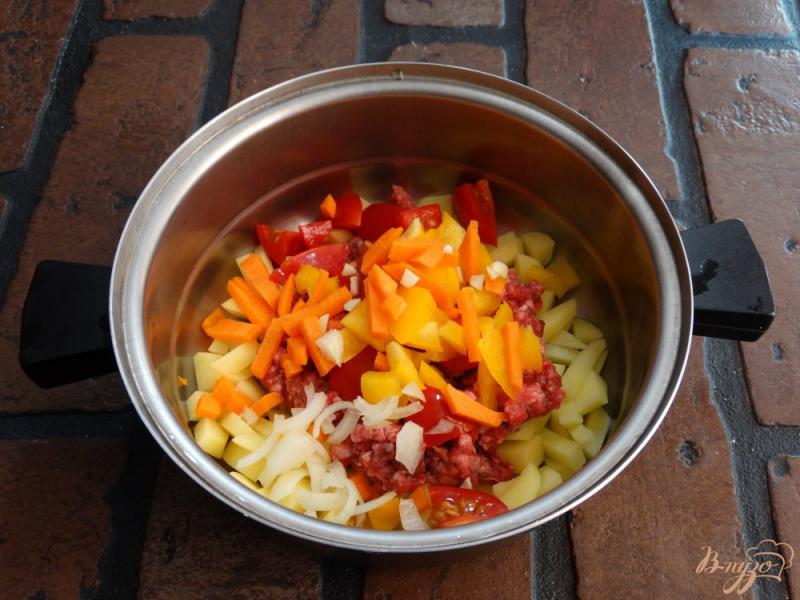 Фото приготовление рецепта: Густой овощной суп с говяжьим фаршем шаг №6