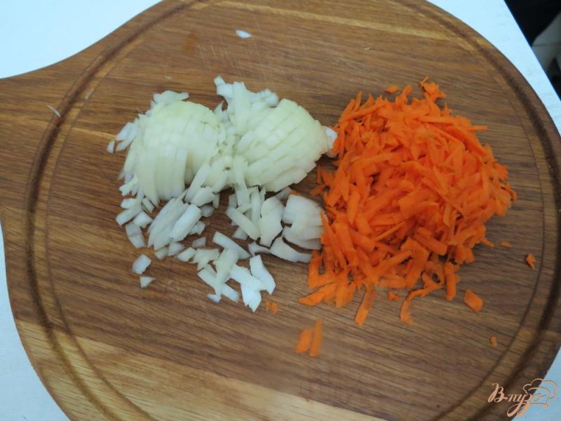 Фото приготовление рецепта: Баклажаны фаршированные рисом и морковью шаг №7