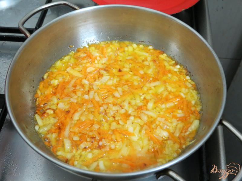 Фото приготовление рецепта: Баклажаны фаршированные рисом и морковью шаг №8