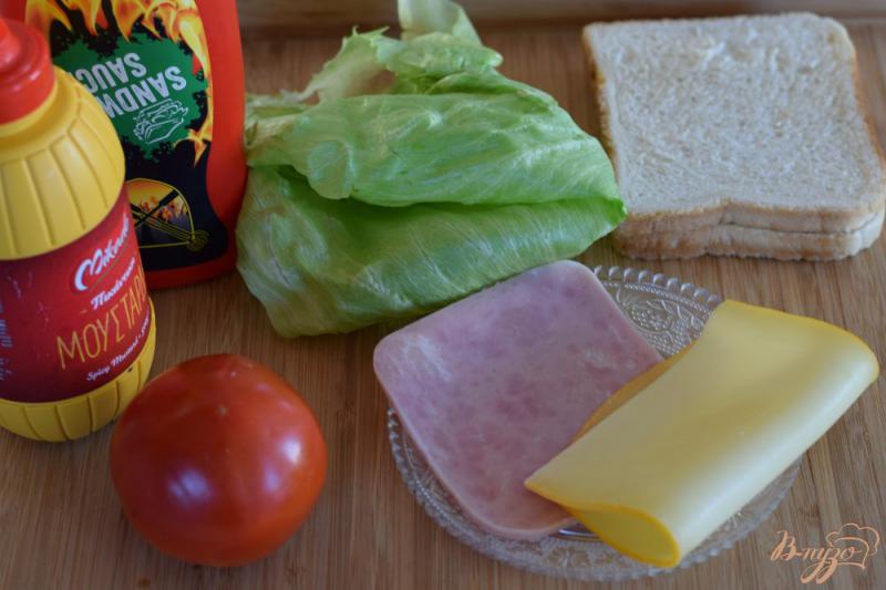 Фото приготовление рецепта: Бутерброд с ветчиной и сыром шаг №1