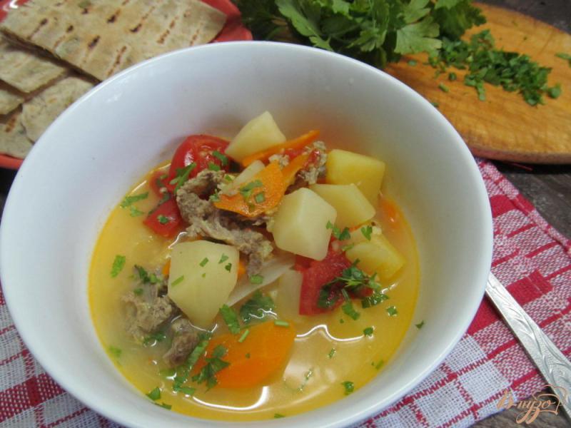Фото приготовление рецепта: Суп на бульоне из баранины с помидором и пшеном шаг №9