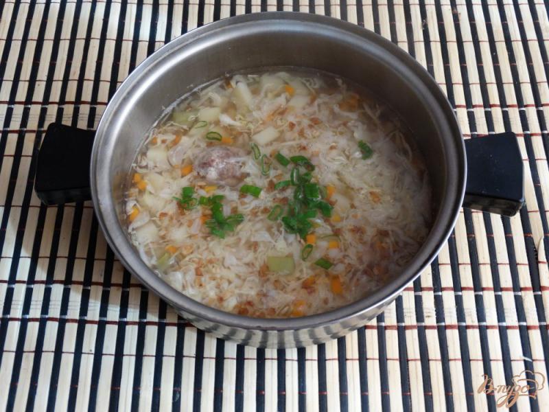 Фото приготовление рецепта: Гречневый суп с молодой капустой шаг №10