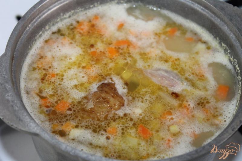Фото приготовление рецепта: Гороховый суп с копченым куриным филе шаг №8