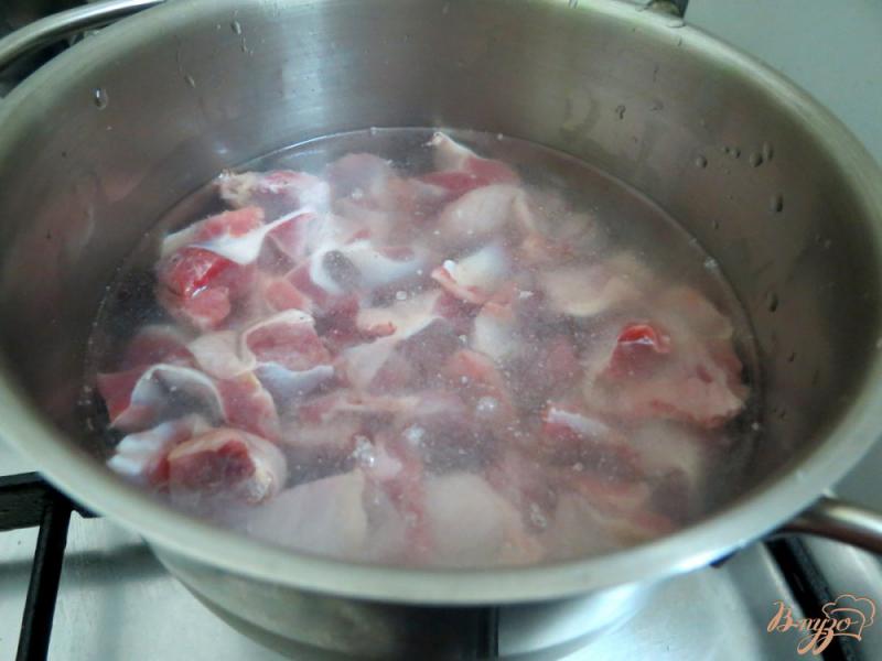 Фото приготовление рецепта: Куриные желудочки в морковном соусе шаг №3