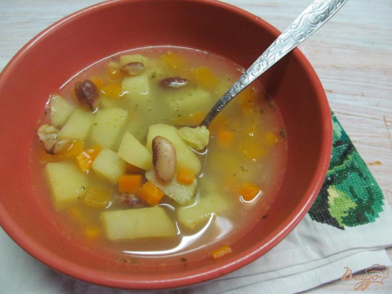 Фото приготовление рецепта: Осенний суп с тыквой цветной капустой и бобовыми шаг №6