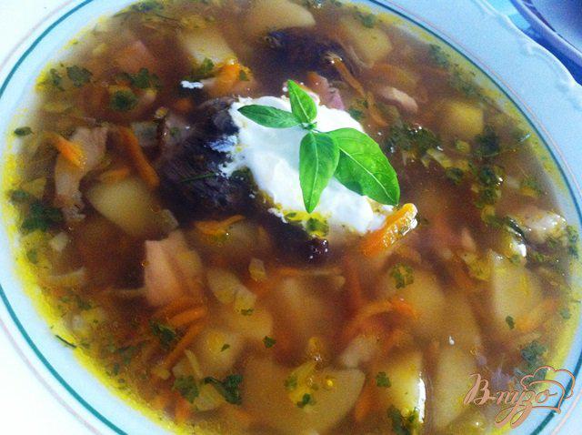 Фото приготовление рецепта: Картофельный суп с белыми, сухими грибами шаг №11