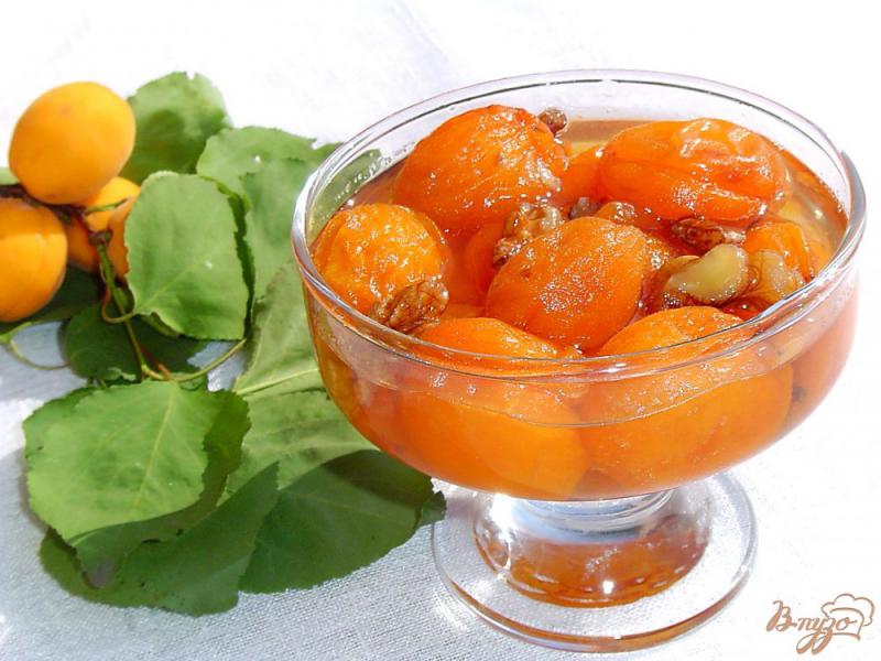 Фото приготовление рецепта: Варенье из абрикос,апельсина,лимона и грецких орехов шаг №7