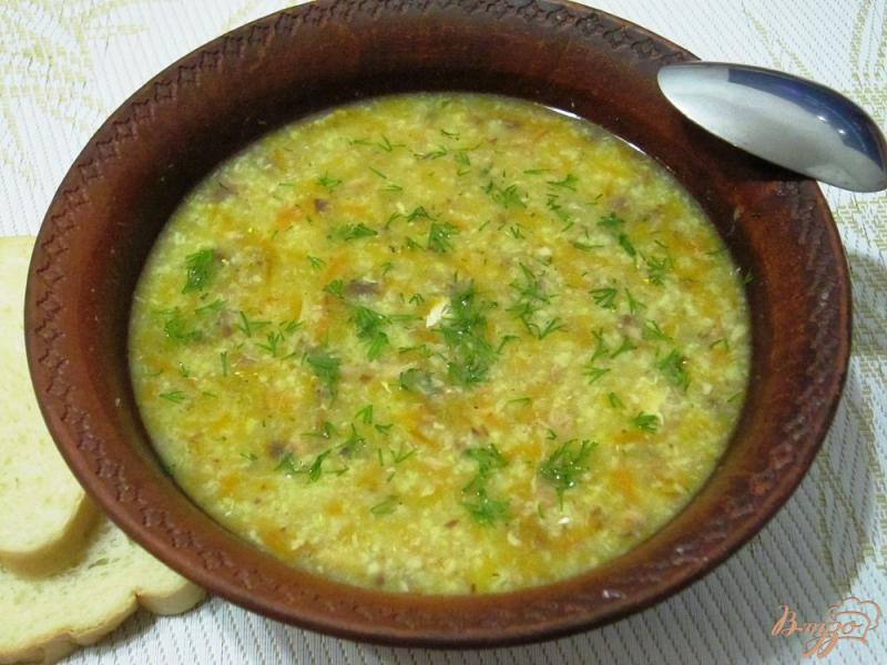 Фото приготовление рецепта: Суп сардинами и пшеном шаг №12