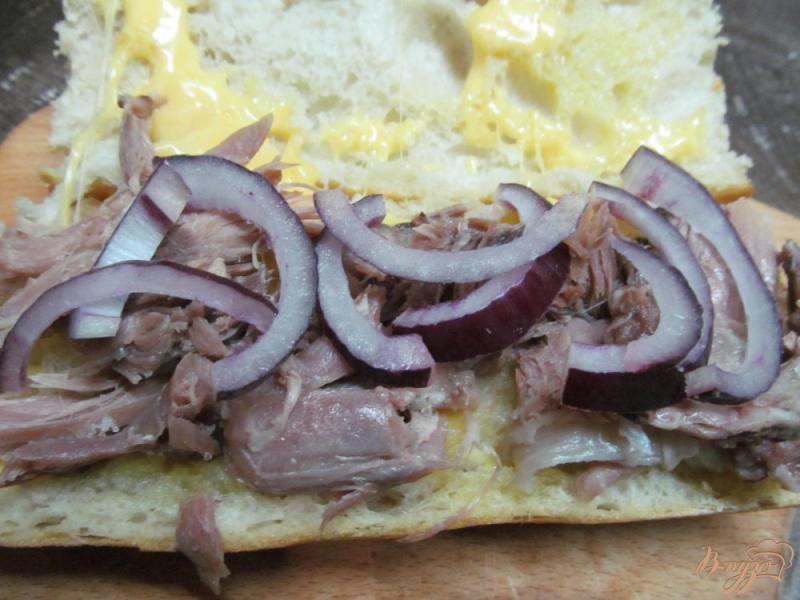 Фото приготовление рецепта: Бутерброд в батоне шаг №6