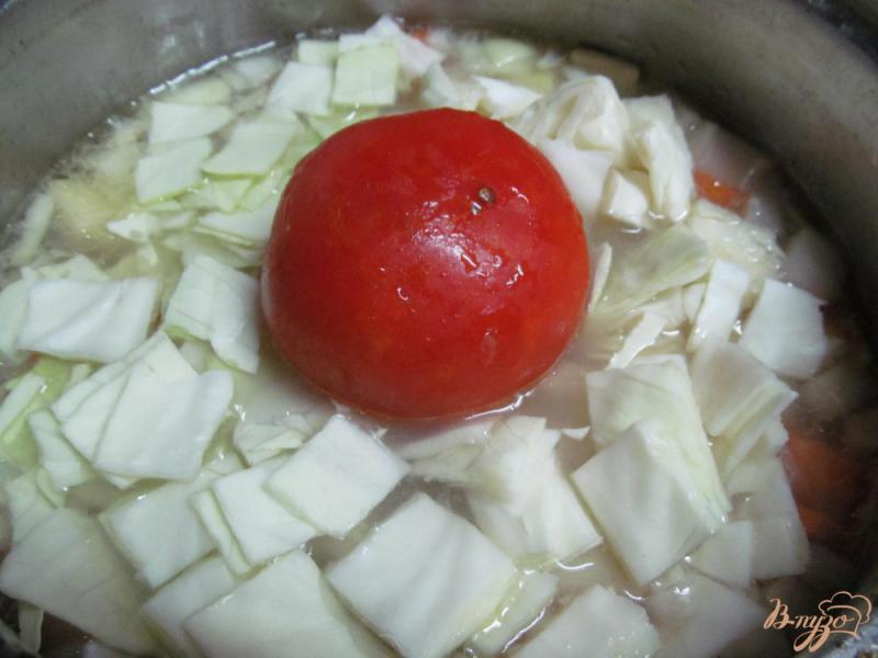 Фото приготовление рецепта: Суп-пюре из моркови с капустой и рисом шаг №4