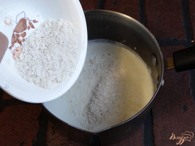 Фото приготовление рецепта: Рисовая каша Кокос-Папайя шаг №2