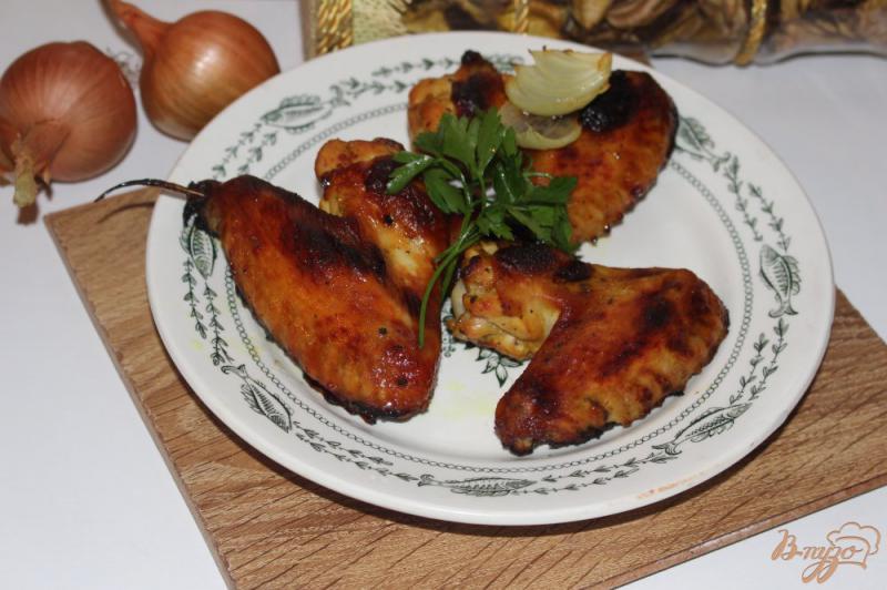 Фото приготовление рецепта: Куриные крылышки в медово-гочичном маринаде шаг №5