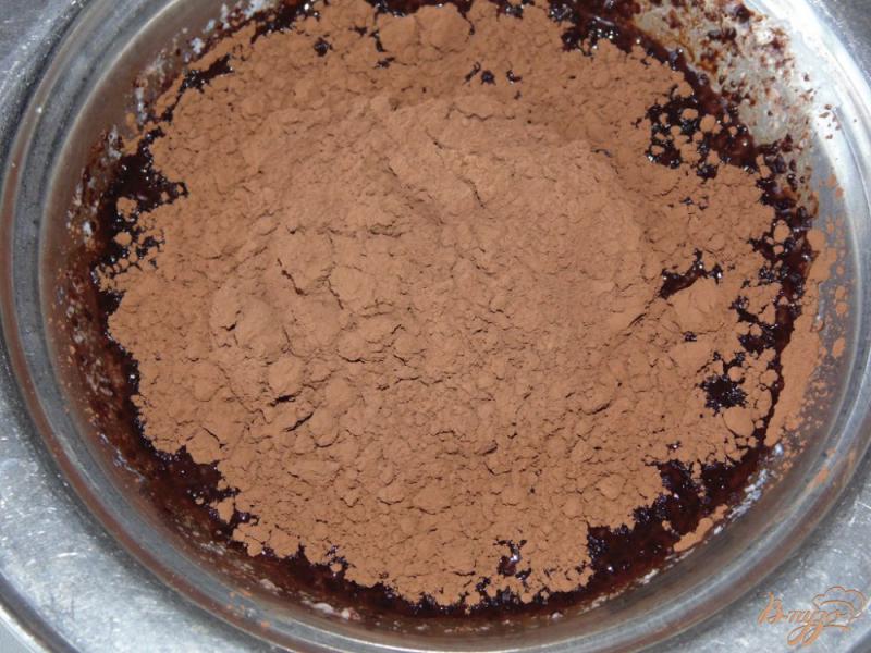 Фото приготовление рецепта: Домашний шоколад с изюмом на сливках и сливочном масле шаг №2