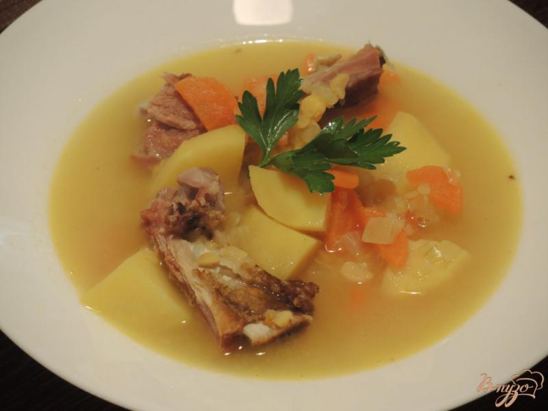 Фото приготовление рецепта: Гороховый суп с рёбрышками шаг №9
