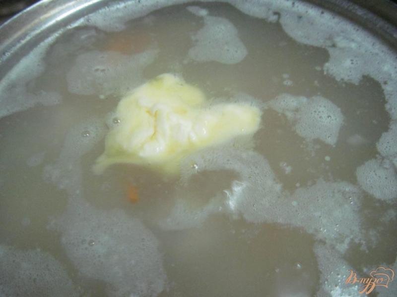 Фото приготовление рецепта: Суп с фрикадельками и булгуром шаг №6
