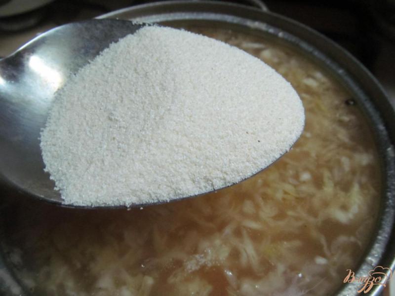 Фото приготовление рецепта: Суп с кислой капустой шаг №8