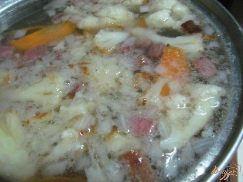 Фото приготовление рецепта: Суп с кислой капустой шаг №5