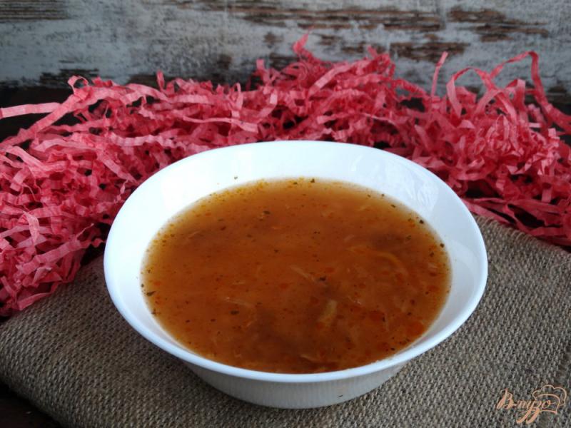Фото приготовление рецепта: Суп с квашеной капустой, опятами и кус-кусом шаг №7