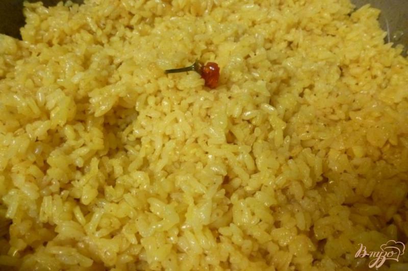 Фото приготовление рецепта: Ароматный гарнирный рис шаг №7
