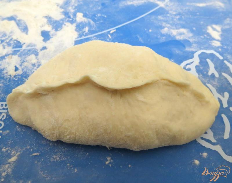 Фото приготовление рецепта: Пирожки из картофельного дрожжевого теста шаг №12