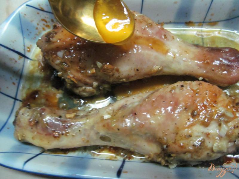 Фото приготовление рецепта: Куриные ножки запеченные под соусом шаг №5