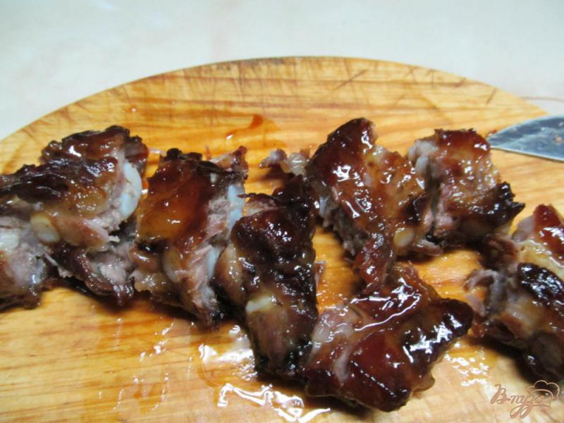 Фото приготовление рецепта: Свиные ребра с мандарином шаг №4