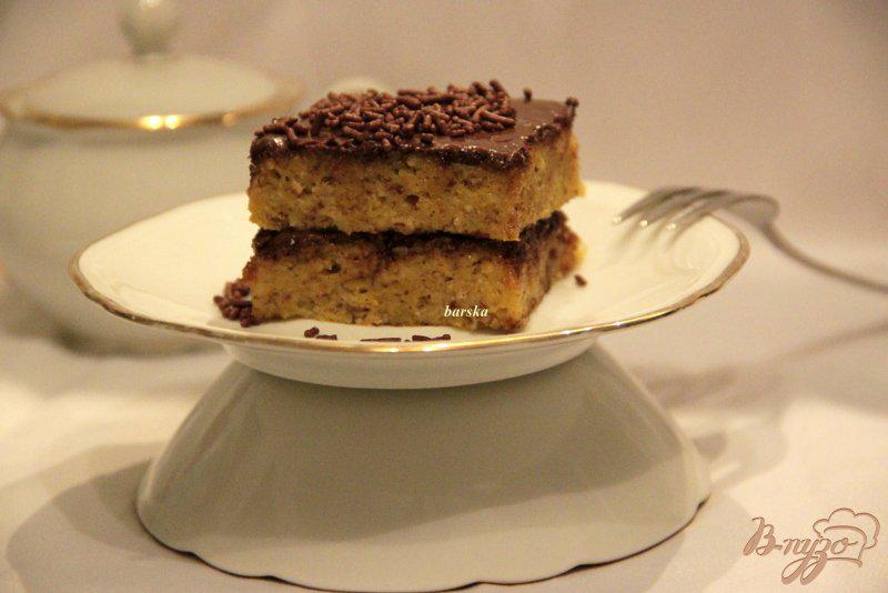Фото приготовление рецепта: Тыквенный кекс с шоколадной глазурью шаг №7