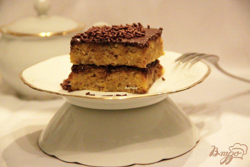 Фото приготовление рецепта: Тыквенный кекс с шоколадной глазурью шаг №8