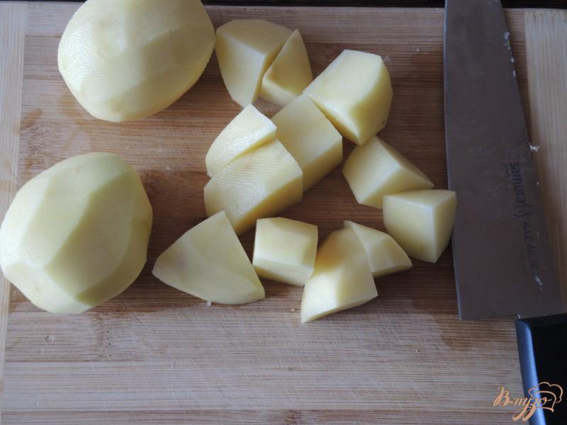 Фото приготовление рецепта: Жаркое из тушёнки и картофеля шаг №5