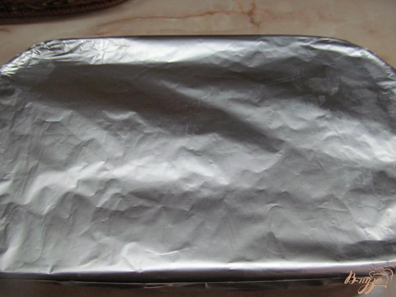Фото приготовление рецепта: Свиные ребра запеченные под маринадом шаг №5