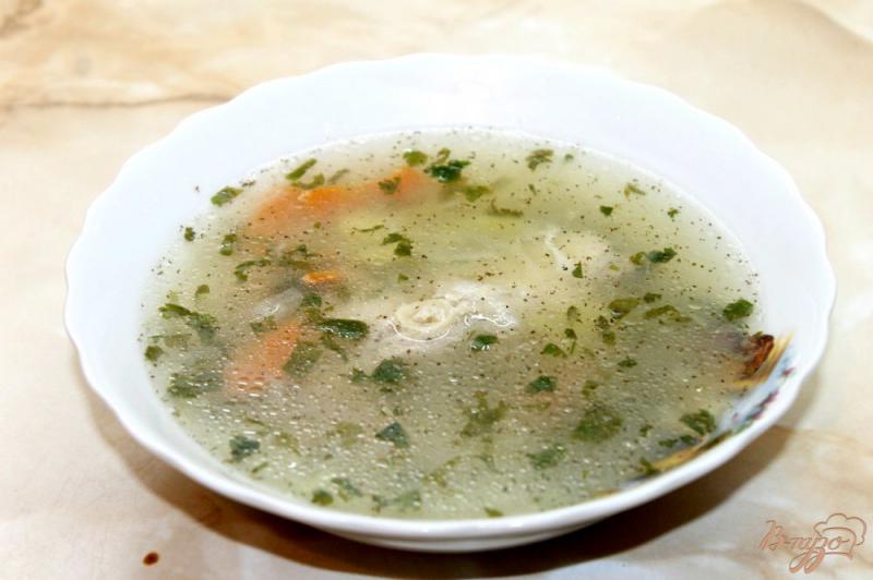 Фото приготовление рецепта: Рыбный суп с толстолобиком и лимоном шаг №5