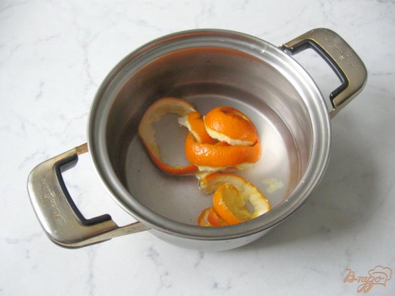Фото приготовление рецепта: Компот из тыквы и апельсина шаг №3