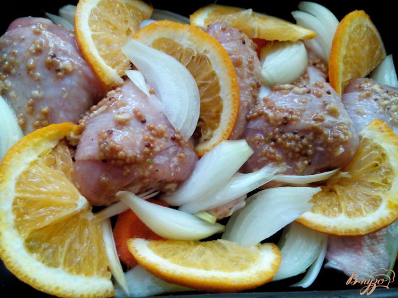 Фото приготовление рецепта: Куриные голени с апельсинами шаг №6