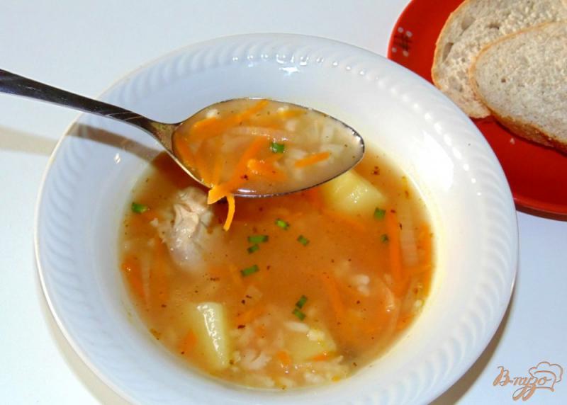 Фото приготовление рецепта: Рисовый суп с томатной заправкой шаг №5