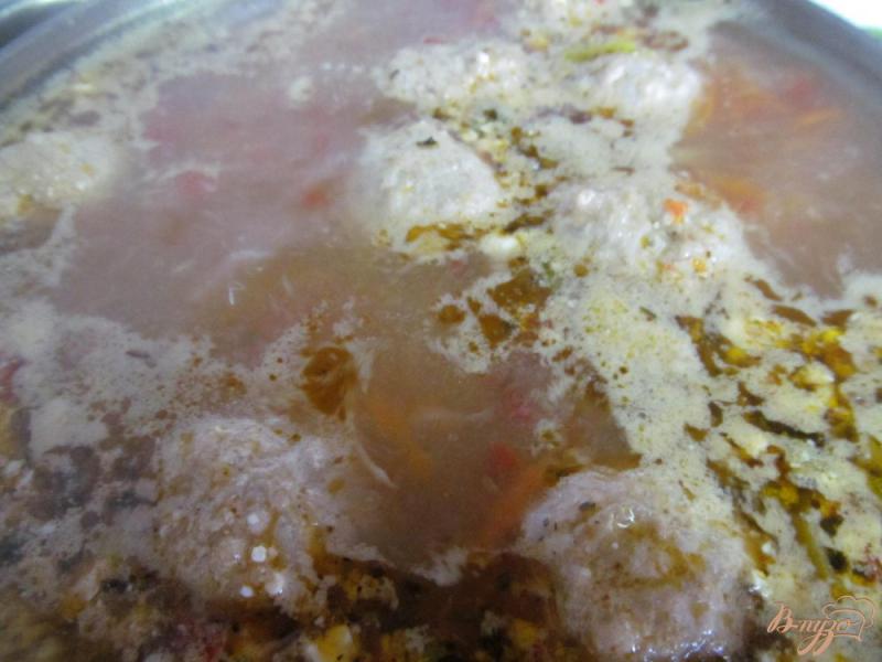 Фото приготовление рецепта: Суп с фрикадельки и щавелем шаг №7